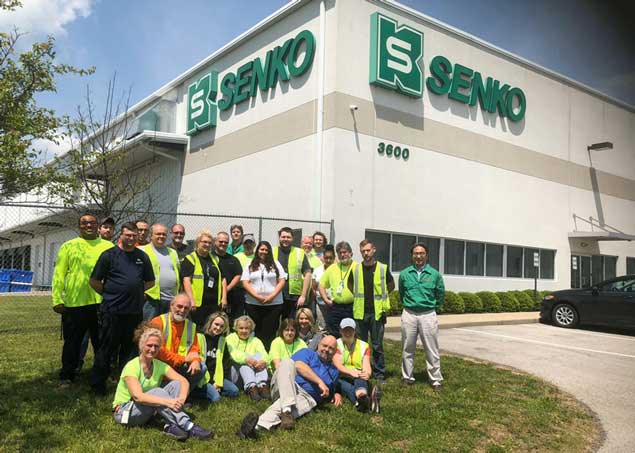 Employees gathered in front of Senko office